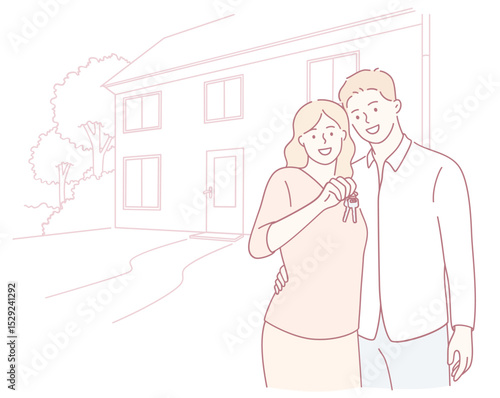 An excited couple joyfully celebrates their new home ownership by proudly holding up their house keys