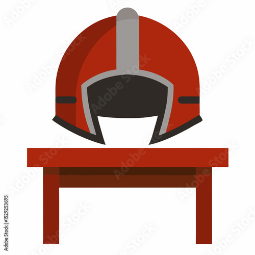 Red football helmet on a wooden table