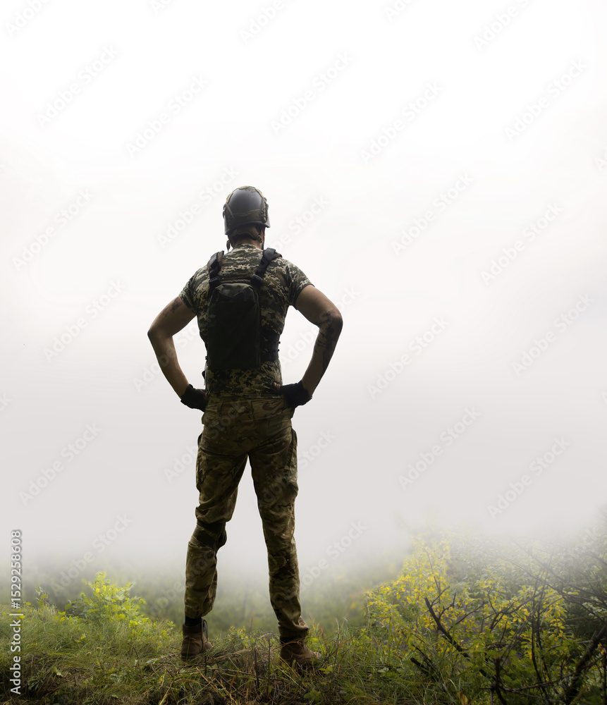 Fototapeta premium Sad soldier look to the sky