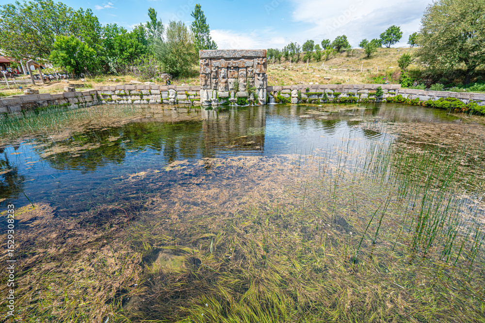 Fototapeta premium The scenic views of Eflatun Pınar, is the name given to a spring, which rises up from the ground, and the stone-built pool monument built at the time of the Hittite Empire, in Konya Turkey