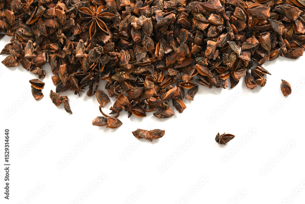 Obraz premium Whole Organic Star Anise. Aromatic Spice Closeup.Star Anise Pods. Natural Dried Spice on White Background. Star Anise Macro. Top View of Dried Star Anise. High-Resolution Stock Image. 