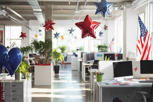 Modern office workspace decorated with red foil balloons in the shape of stars near each table, white interior, open space office, monitors on white tables. USA Independence Day, themed treats