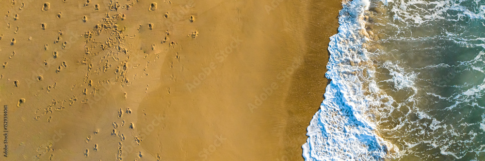 Florianópolis, Campeche beach during sunrise. Brazil. Rio Tavares neighborhood. Wave formation in web banner aerial view. Florianópolis, Campeche beach during sunrise. Brazil. Rio Tavares neighborhood. Wave formation in web banner aerial view.