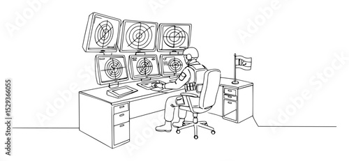soldier monitoring surveillance data in base control room