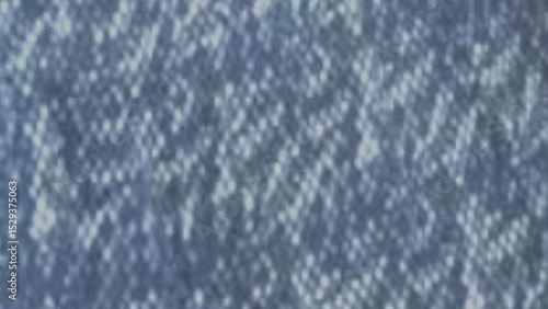 Abstract blue and white speckled texture background