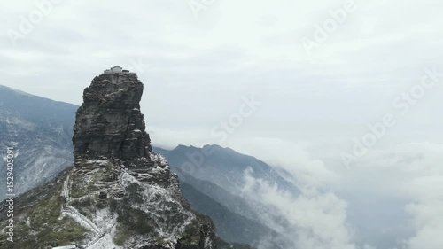Timelapse of red cloud golden dome at fanjing mountain as clouds and mist roll in, guizhou province, china