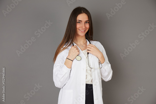 young female doctor - studio background