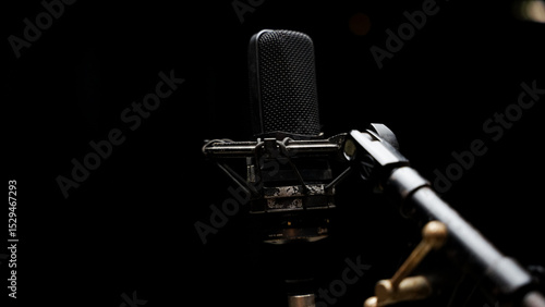 Podcast or Vocal Recording Equipment in Studio Isolated on Dark Background