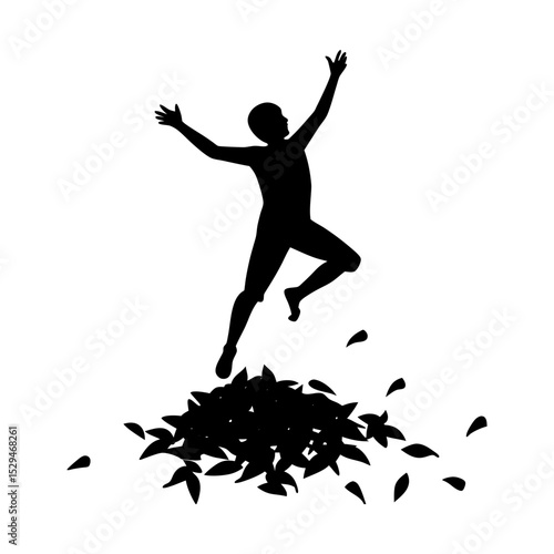 Person jumping in autumn leaves silhouette