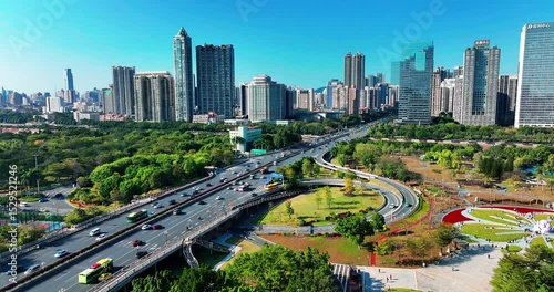 Aerial view of guangzhou cityscape featuring guangzhou bridge and busy traffic on a clear day