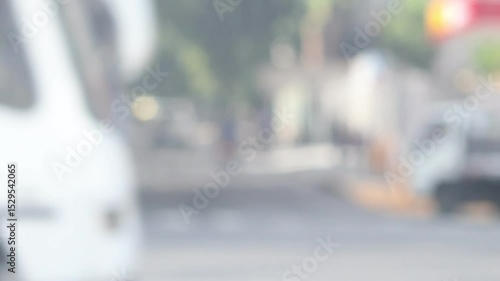 Wallpaper Mural Blurred Urban Traffic with Buses Passing by in real Motion Background Loop

 Torontodigital.ca