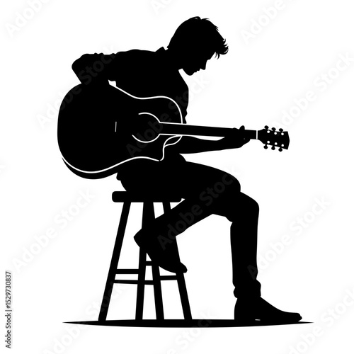 Young man playing acoustic guitar while seated on a stool - Concept of Art and creativity  