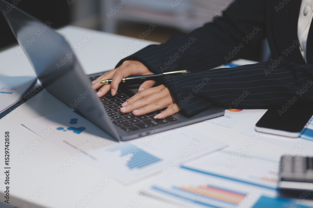 Fototapeta premium Audit concept,Administrator business man financial inspector and secretary making report calculating balance. Internal Revenue Service checking document.