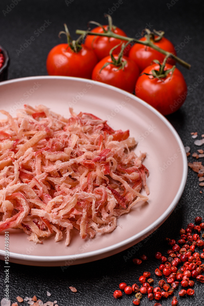 Food, dried squid in shavings or chopped as snacks or jerky. Snack dried squid for beer Food, dried squid in shavings or chopped as snacks or jerky. Snack dried squid for beer