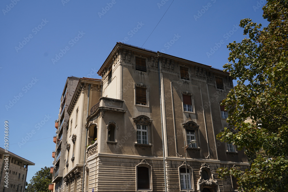 Fototapeta premium Facade of old building with windows.