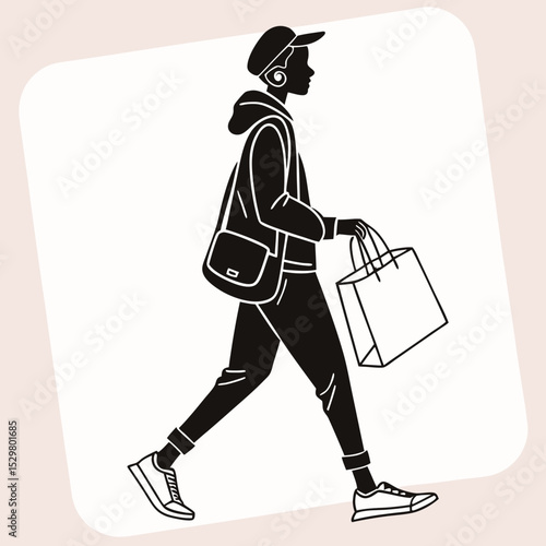 Stylish young person walking with shopping bag and shoulder bag