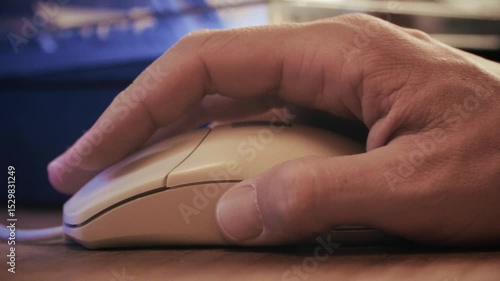 Man working and gaming on retro computer PC, IT engineer with vintage computer at home, using old fashion technology, close up of retro setup. 