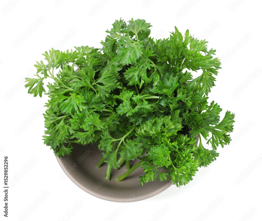 Fototapeta premium Fresh parsley in bowl isolated on white, top view