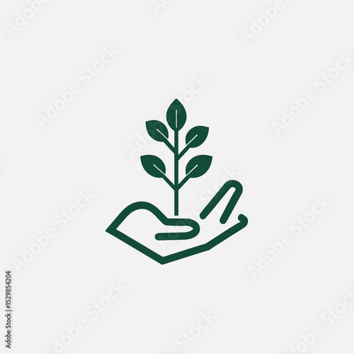 Hand nurturing a green plant in a pot, symbolizing new life and natural growth