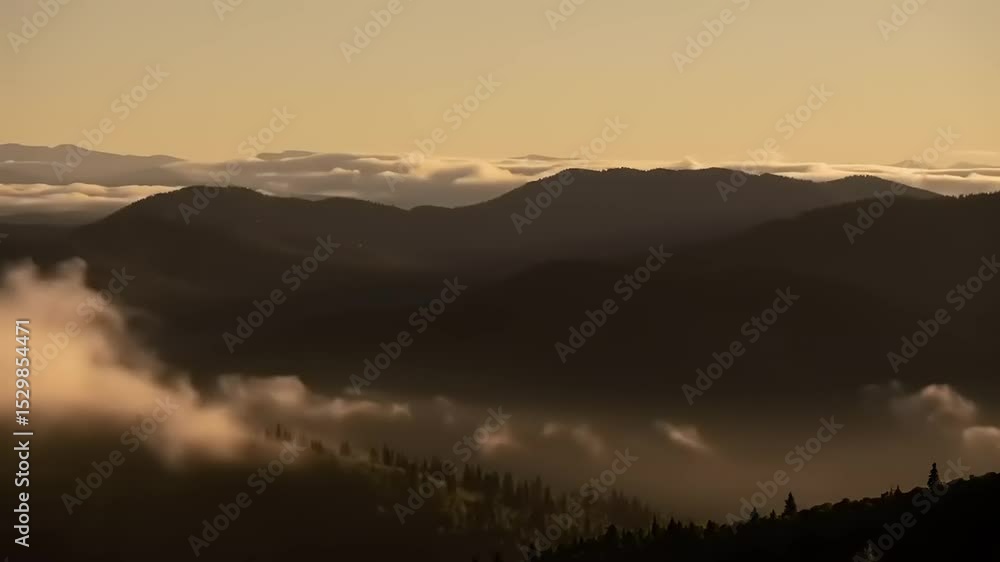 Serene Mountain Landscape at Sunrise with Misty Clouds and Soft Golden Light in the Background Serene Mountain Landscape at Sunrise with Misty Clouds and Soft Golden Light in the Background