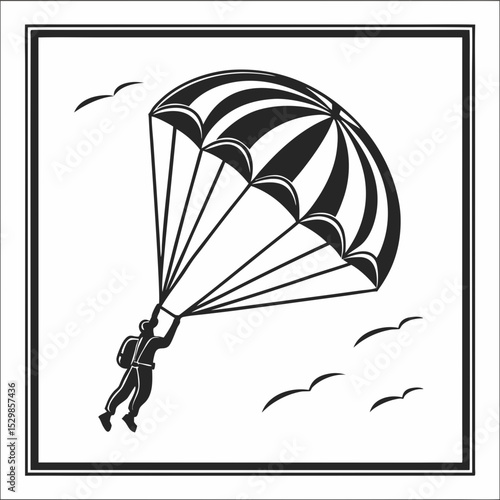 Skydiver descending under striped parachute