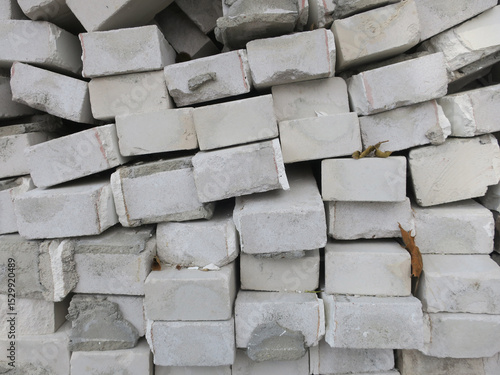 heap of grey colored bricks