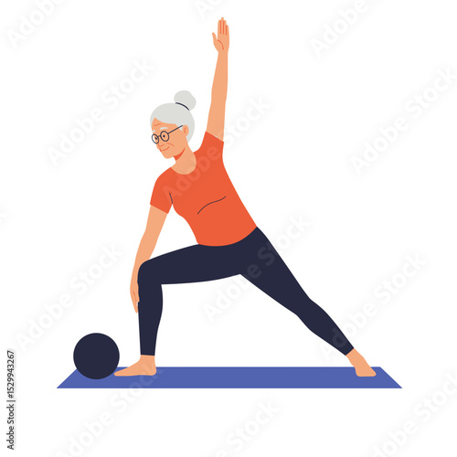 Elderly woman practicing pilates with a ball on a yoga mat  