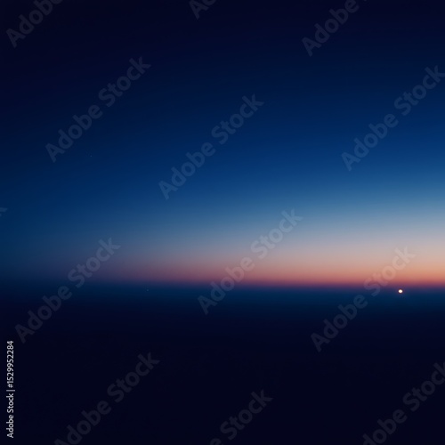 Nature's beauty: blue sky, sun, and clouds at sunrise over the sea