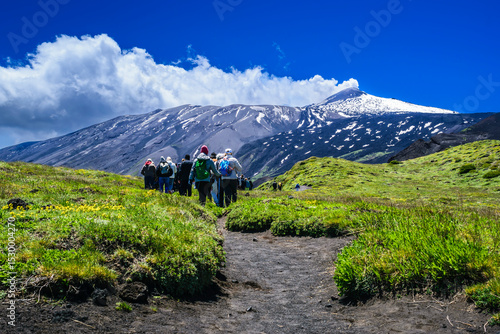 Hikers on Mount Etna Against a Dramatic Landscape
