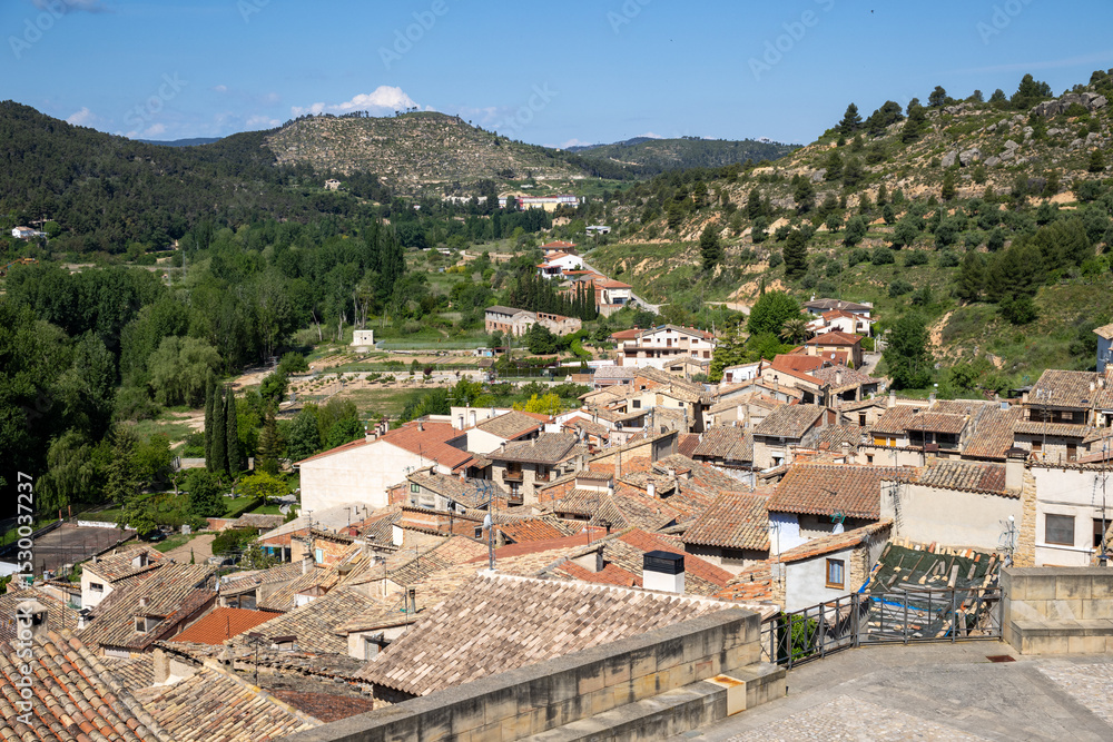 Obraz premium Historic town of Valderrobres seen from castle ramparts, with river and rooftops. Teruel, Spain.Matarraña