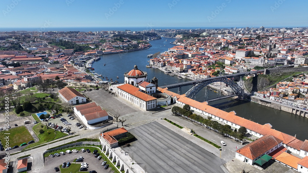 Naklejka premium Serra Do Pilar Monastery At Porto In Porto District Portugal. Luis I Bridge. Ribeira Pier. Historical City Scene. Serra Do Pilar Monastery At Porto District In Portugal. Tourism Landmarks.