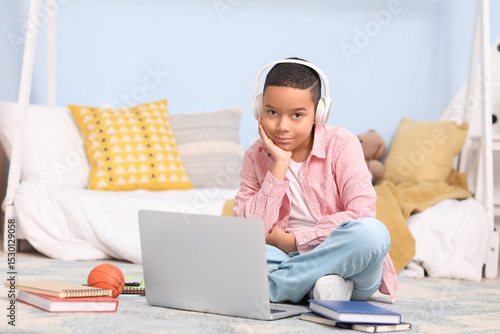Little African-American boy...