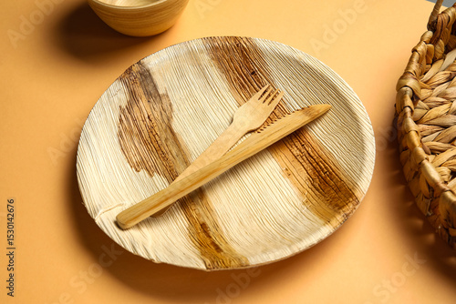 Wooden plate and cutlery on...