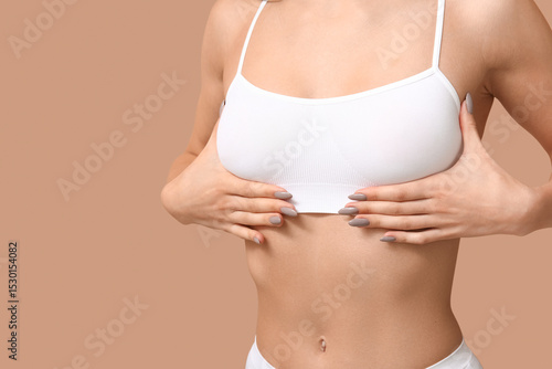 Young woman checking her br...
