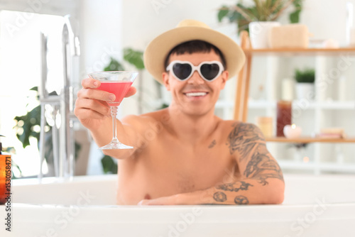 Young man in sunglasses wit...