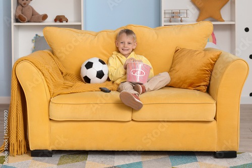 Cute little boy watching TV...