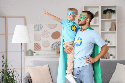 Happy father with his littl...