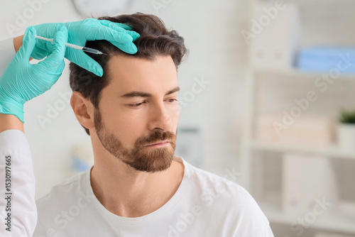Doctor giving man injection...