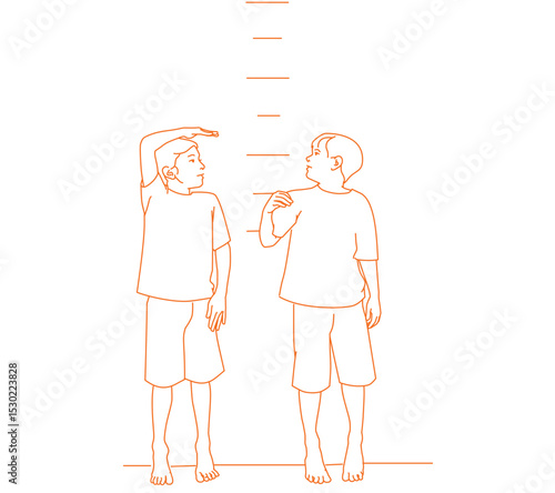  Boys measuring themselves against marks on wall.