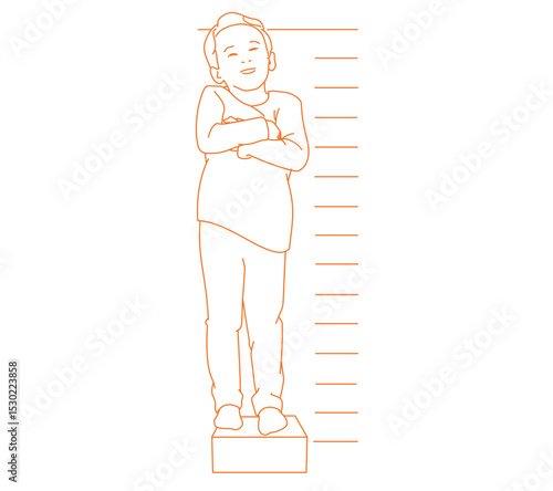 Child measuring his height on wall. He is growing up so fast