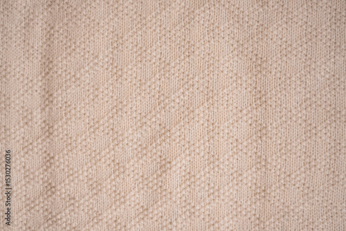 Light Beige Knitted Fabric Texture Background