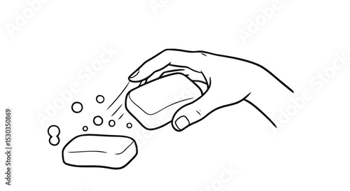 Hand using soap bar