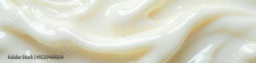 Close-up shot of a thick, viscous, oily white substance with a glossy sheen, textured surface, and subtle highlights  The substance appears creamy and almost translucent in places ,  paint,  chemical