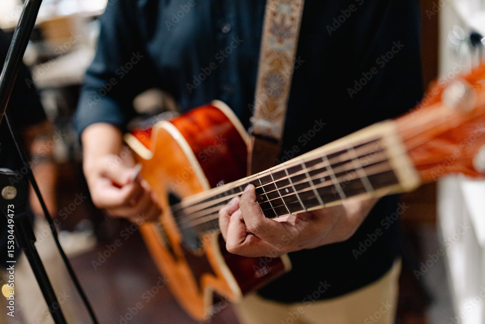 Fototapeta premium musician playing guitar