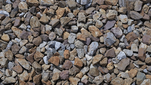 Obraz na plátně Close-up, high-angle shot reveals a dense, textured field of railway ballast roc