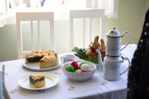 Wallpaper Mural Easter table setting with traditional czech cake, colored eggs and vintage coffee pot in Kourim, Czechia Torontodigital.ca