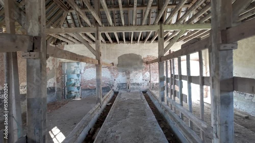 Wallpaper Mural An aging, weathered barn interior that beautifully showcases exposed beams, creating a rustic and inviting atmosphere Torontodigital.ca