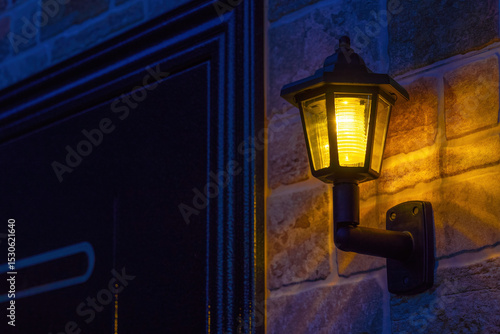 Decorative lantern on the wall of a private house