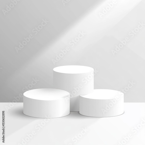 Three white cylinders on a light gray background, casting shadows