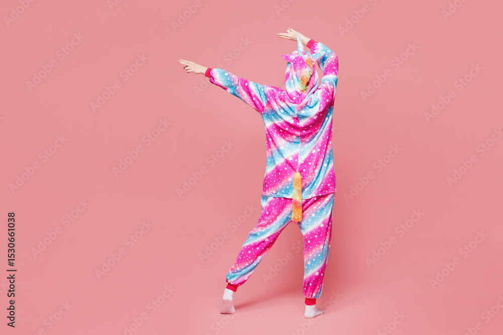 Obraz premium Full body back rear view young woman she wear domestic costume with hoody and animal ears look aside on area dancing isolated on plain pastel light pink background studio portrait. Lifestyle concept.